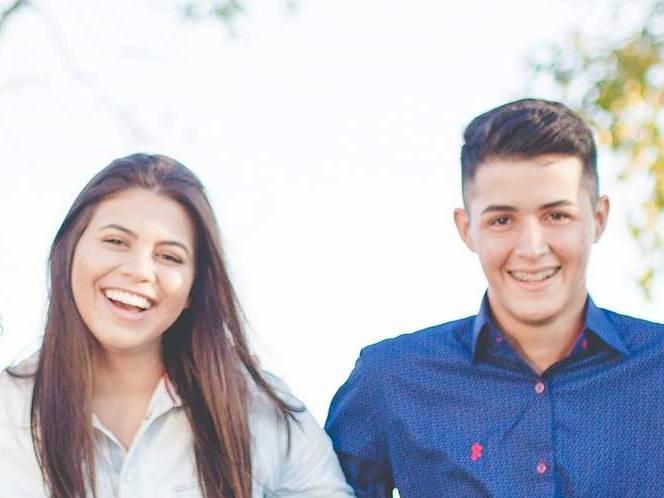 Man and woman smiling for picture