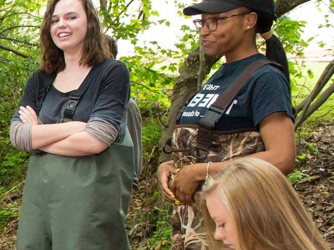 A group of students outdoors communicating